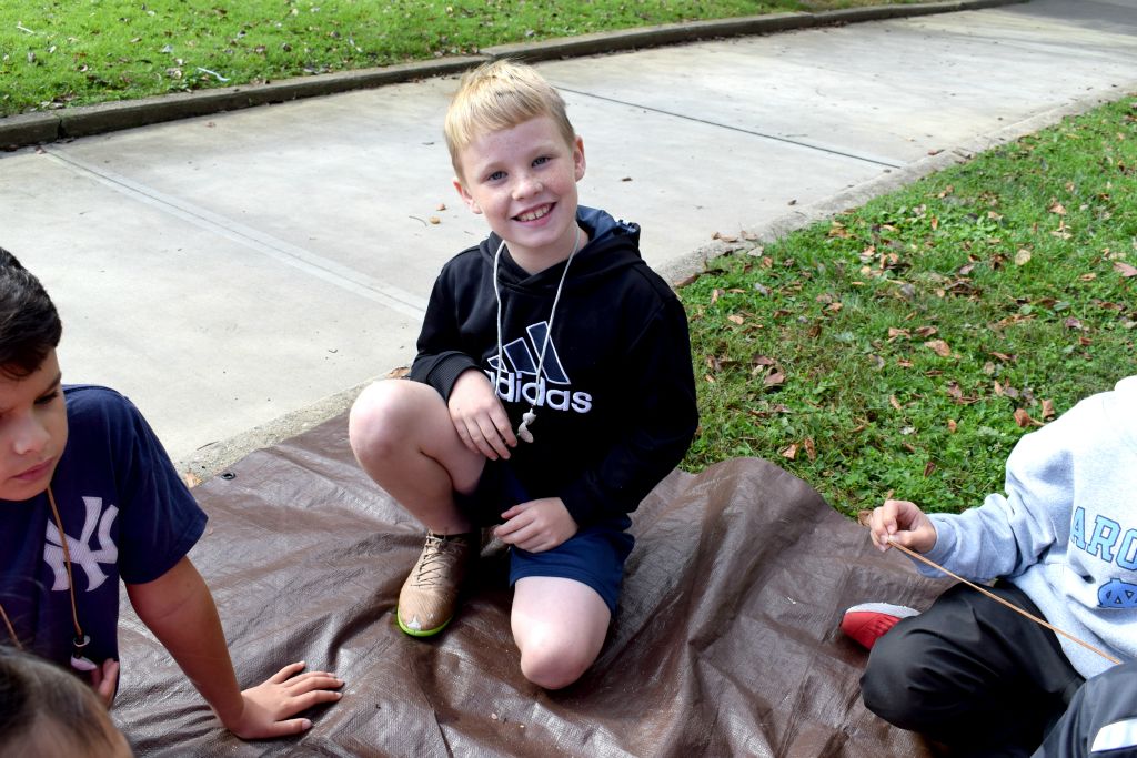 students making necklaces 